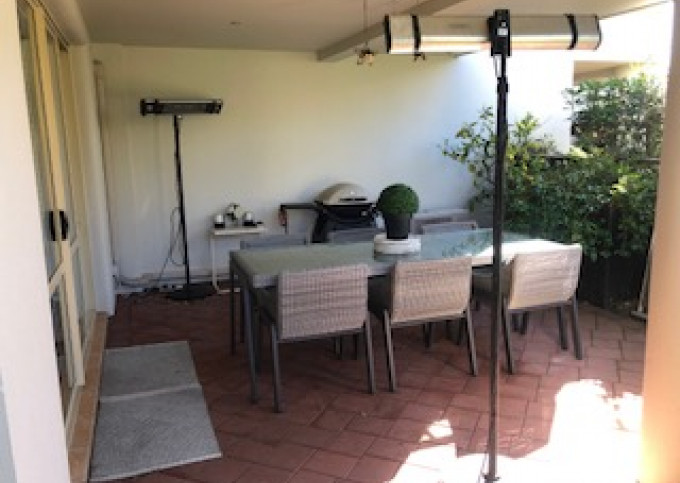 Outdoor heaters and barbeque for alfresco dining